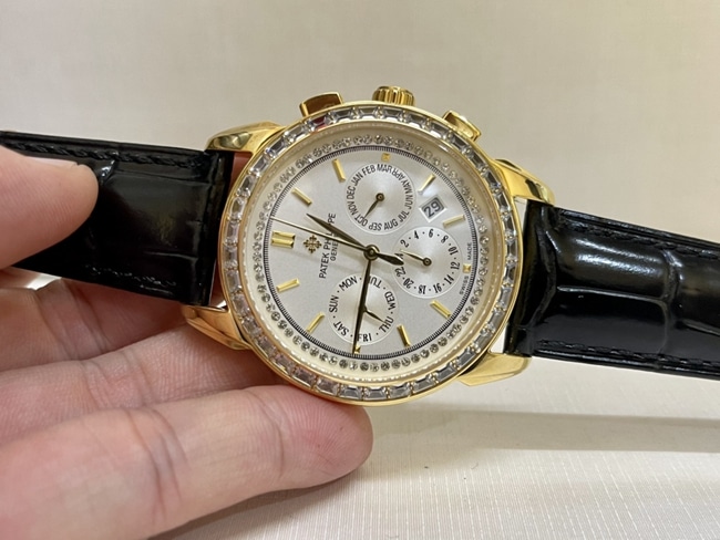 top-tier watch Patek Philippe women's white dial black belt complex chronograph function series leather strap watch front view