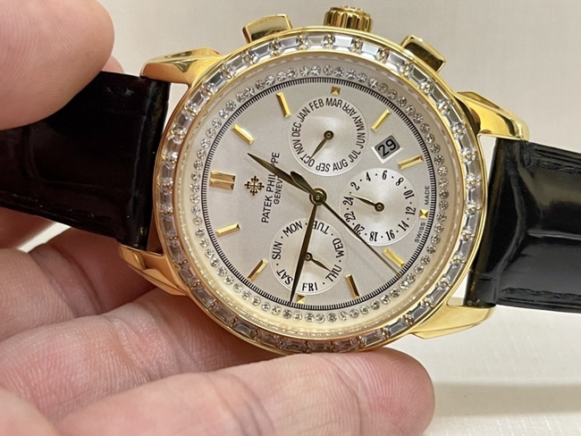 top-tier watch Patek Philippe women's white dial black belt complex chronograph function series leather strap watch front view