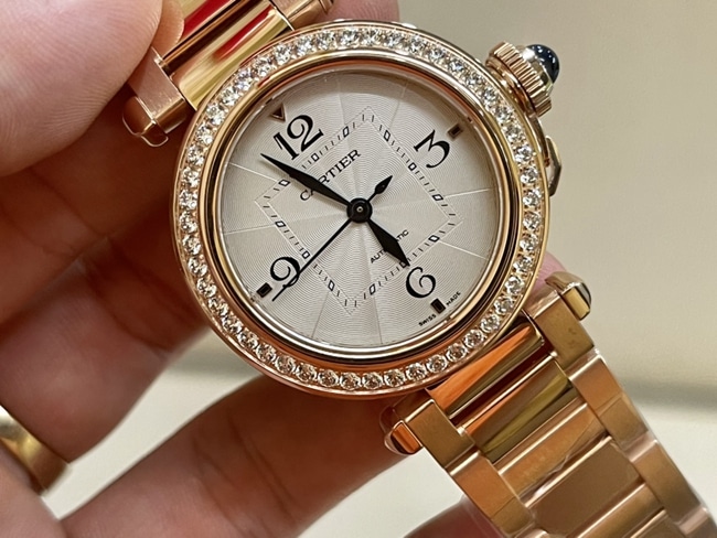top-tier watch Cartier women's white dialsteel bracelet key series 18krose gold watch front view