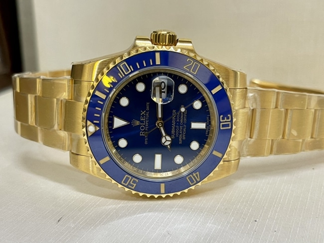 Top-tier watch Rolex men's blue dial gold band blue Submariner automatic movement watch front view
