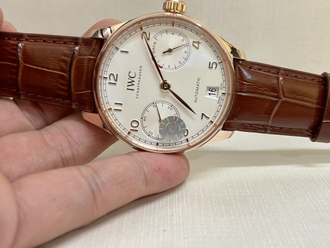 top-tier watch IWC men's white dial brown belt Portuguese 7 series natural diamond automatic movementleather strap watch front view