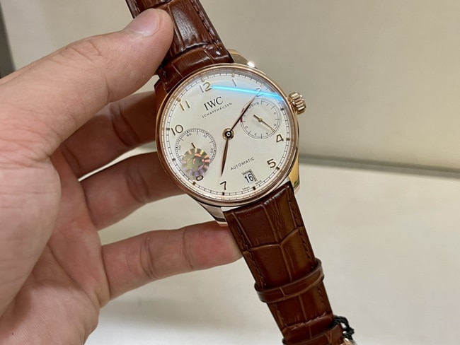 top-tier watch IWC men's white dial brown belt Portuguese 7 series natural diamond automatic movementleather strap watch front view