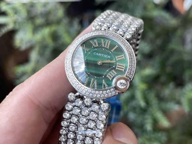 top-tier watch Cartier women's green dialsteel braceletquartz blue balloon series watch front view
