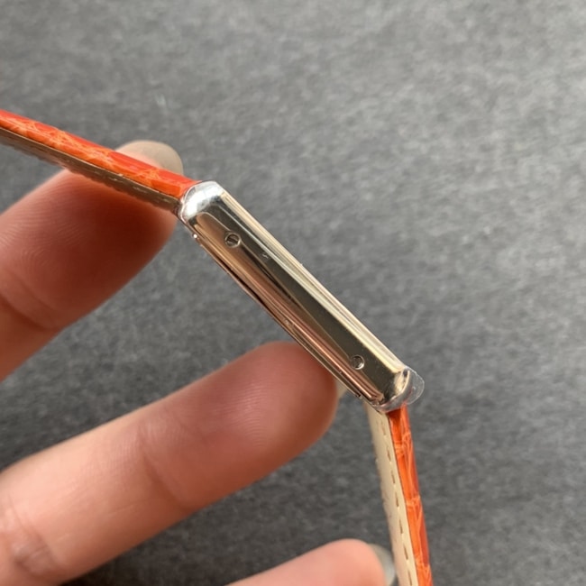 K11 factory top-tier watch Cartier women's tank series pink plate orange belt automatic movementleather strap watch side view