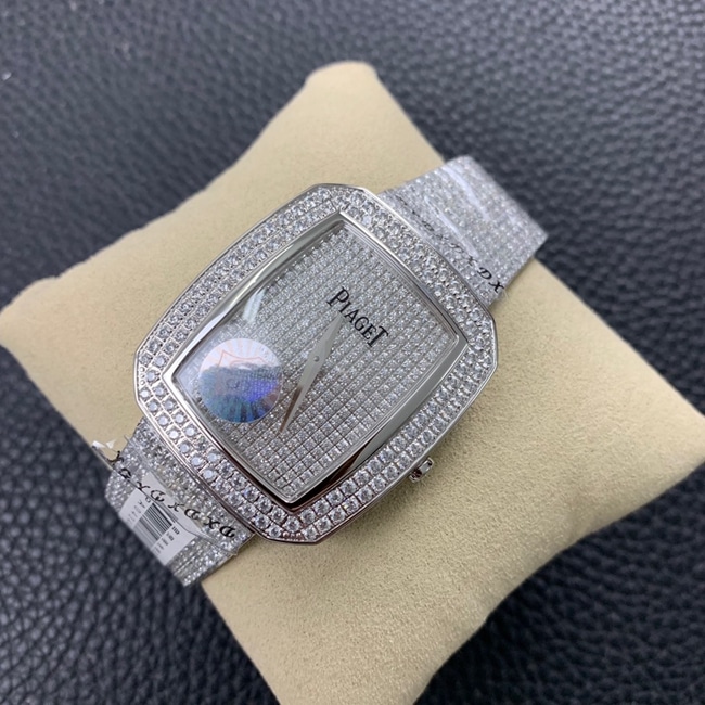 Top Piaget women's watch, white dial, steel strap, Extraordinary Treasures collection, full diamond watch, front view.