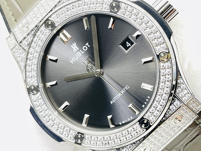 watch Hublot Hublot watch Big Bang Sang Bleu series men's black dial green strap watch front view