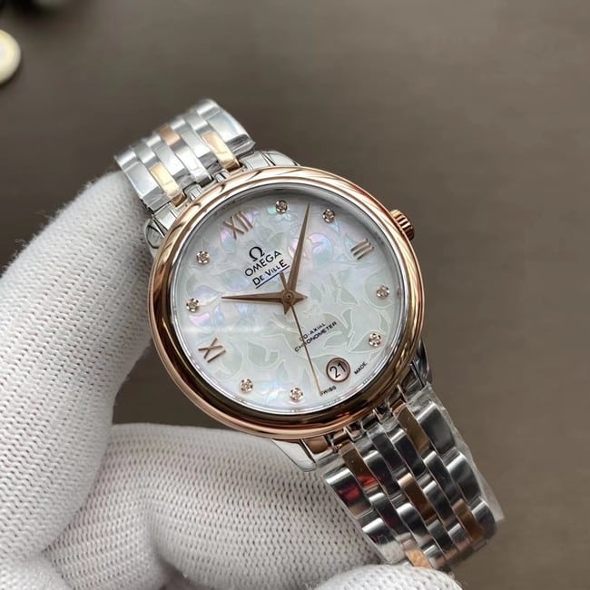 Top watch Omega De Ville series women's white dial two-tone metal bracelet mechanical watch front view