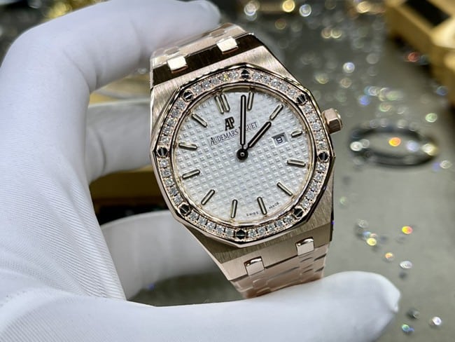 top-tier watch Audemars Piguet men's white dial gold band Royal Oak automatic movement watch front view