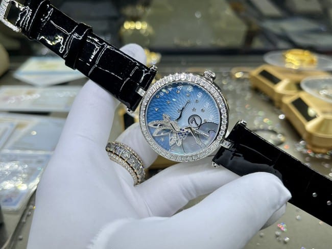 top-tier watch Van Cleef & Arpels ladies blue dial black belt fairy series leather strap watch front view