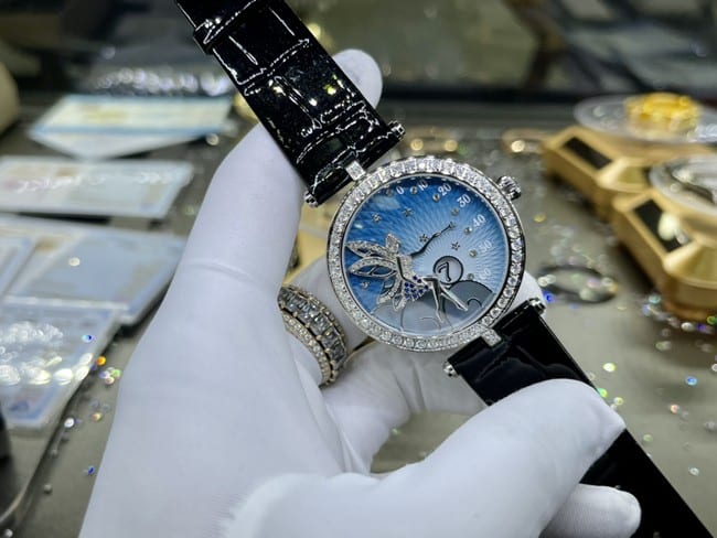 top-tier watch Van Cleef & Arpels ladies blue dial black belt fairy series leather strap watch front view