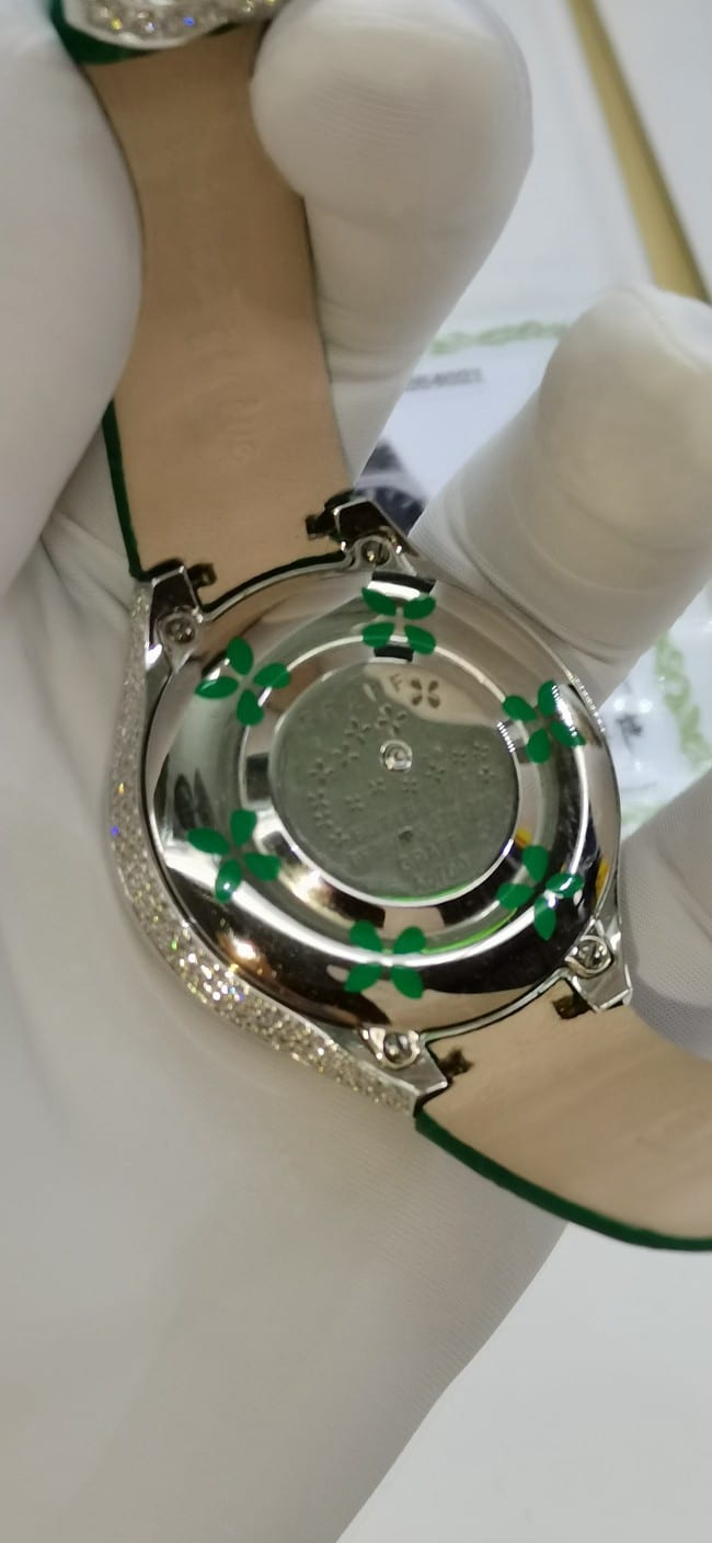 Top watch, Graff women's watch, white dial, green strap, full of stars series, quartz, real gold, real diamonds, leather strap watch, case back photo