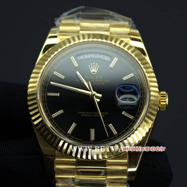 Rolex top collectible watches men's black plate gold band double calendar automatic mechanical front view