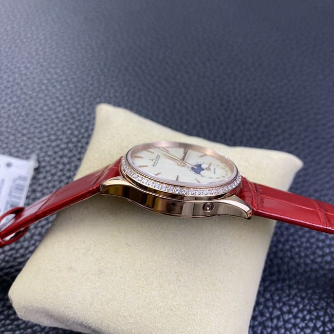 Jaeger-LeCoultretop-tier watch ladies white dial red dot moon phase master automatic movementleather strap side view