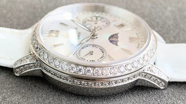 Patek Philippetop-tier watch fully automatic movement women's white dialleather strap side view
