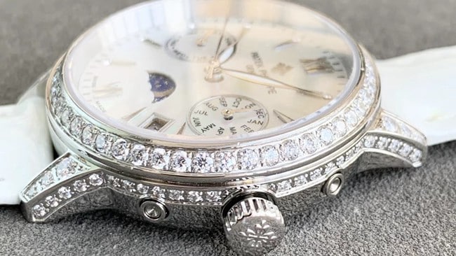 Patek Philippetop-tier watch fully automatic movement women's white dialleather strap side view