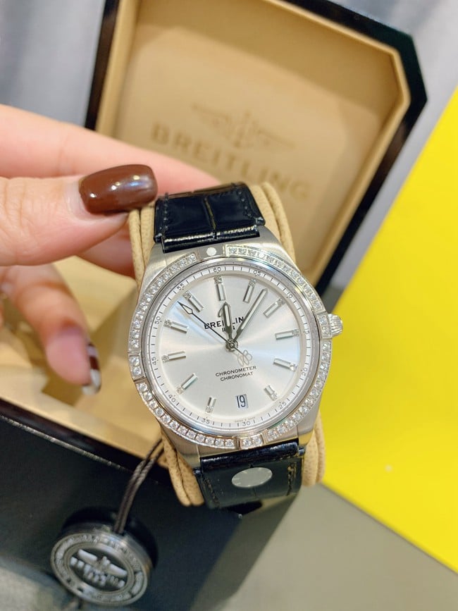 Breitlingtop-tier watch Nanhai capsule series fully automatic movementleather strap women's white dial black belt front view