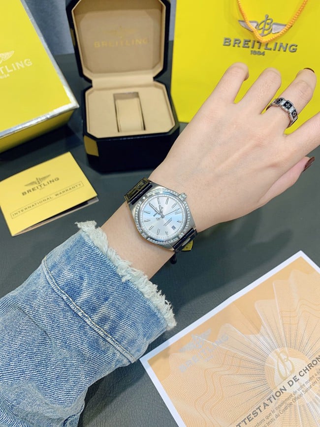 Breitlingtop-tier watch Nanhai capsule series fully automatic movementleather strap women's white dial black belt front view