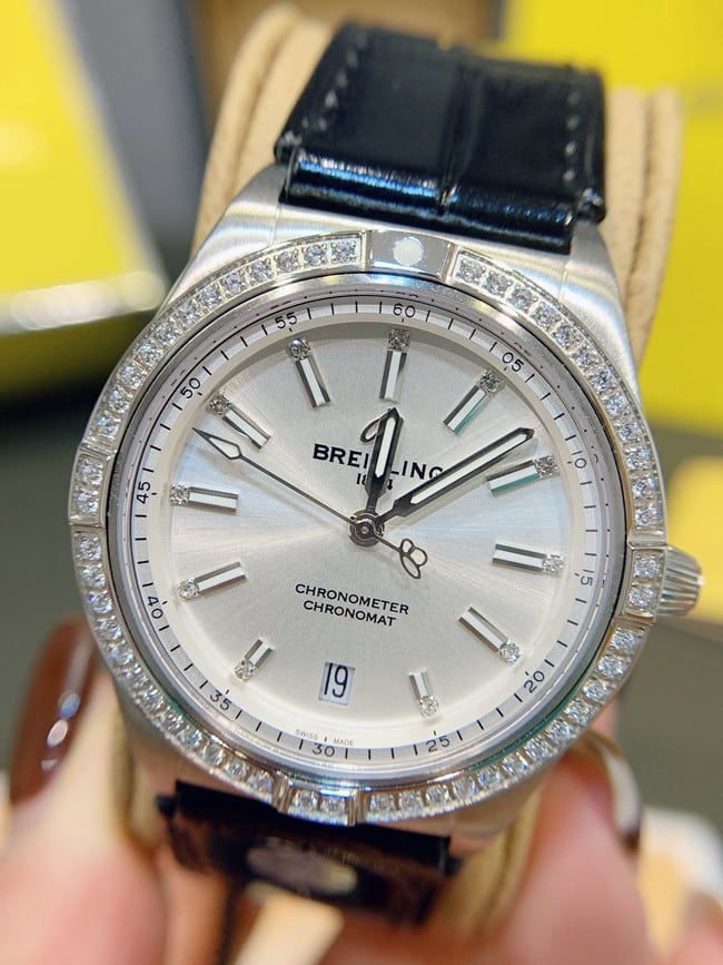 Breitlingtop-tier watch Nanhai capsule series fully automatic movementleather strap women's white dial black belt front view
