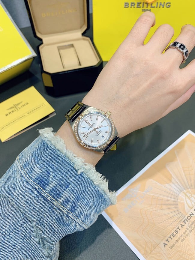 Breitlingtop-tier women's white dial black belt fully automatic movementleather strap Nanhai capsule series watch front view