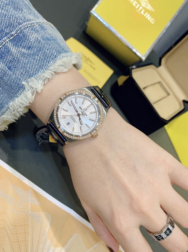Breitlingtop-tier women's white dial black belt fully automatic movementleather strap Nanhai capsule series watch front view