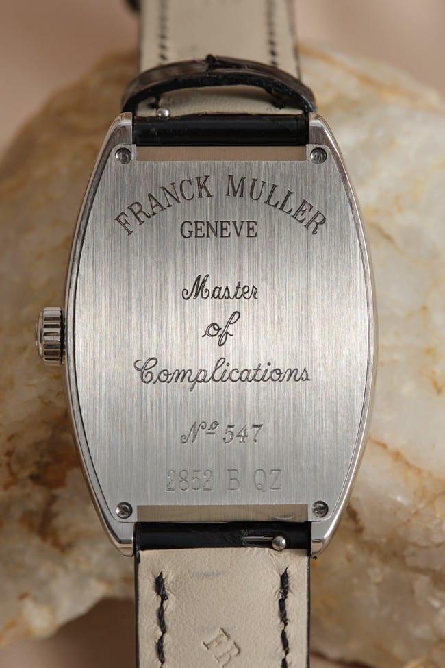 Franck Muller top-tier replicaquartz women's white dial black belt barrel-shaped leather strap watch back picture