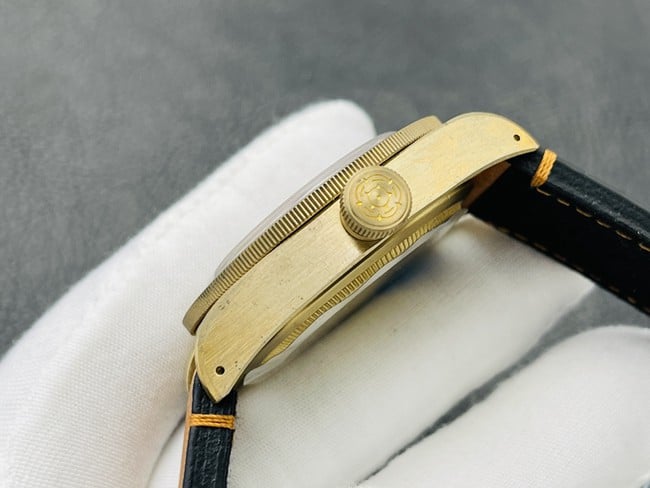 top-tier Tudor Biwan bronze model M79250BA-0001 orange strap watch side view