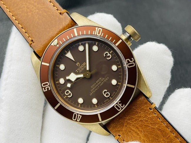 top-tier Tudor Biwan bronze model M79250BA-0001 orange strap watch front view