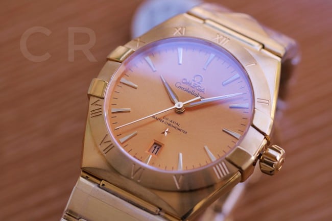 Top collectible watches Omega 5th Generation Constellation Series Gold Plate Gold Steel Strap Men's Earth Watch Front View