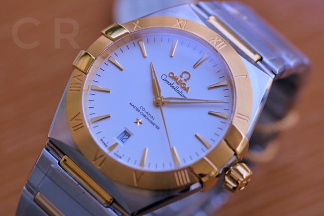 Top Omega Constellation 5th generation white dial silver steel strap men's wristwatch front view