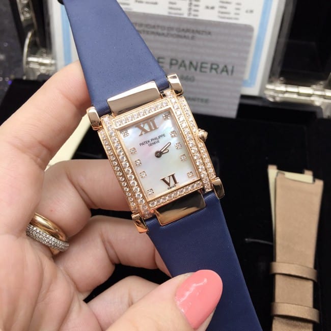 AW factory real diamond replicaPatek Philippewhite dial blue belt ladies' watch front view