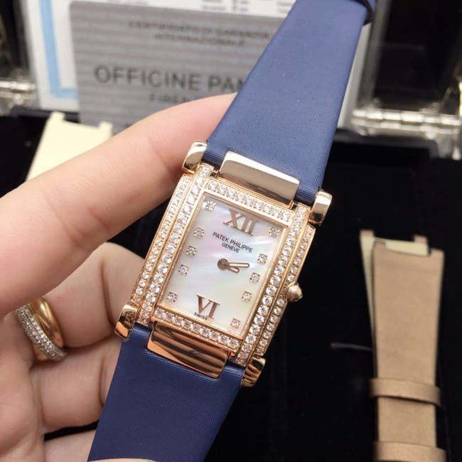 AW factory real diamond replicaPatek Philippewhite dial blue belt ladies' watch front view