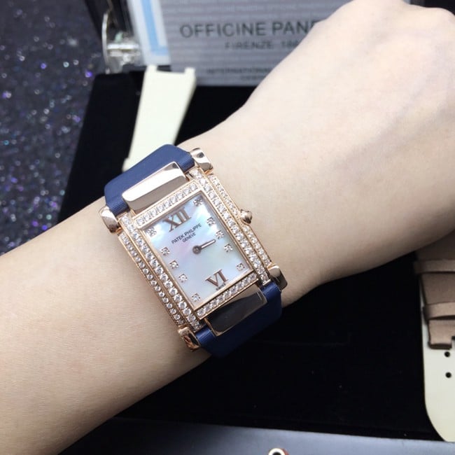 AW factory real diamond replicaPatek Philippewhite dial blue belt ladies' watch front view
