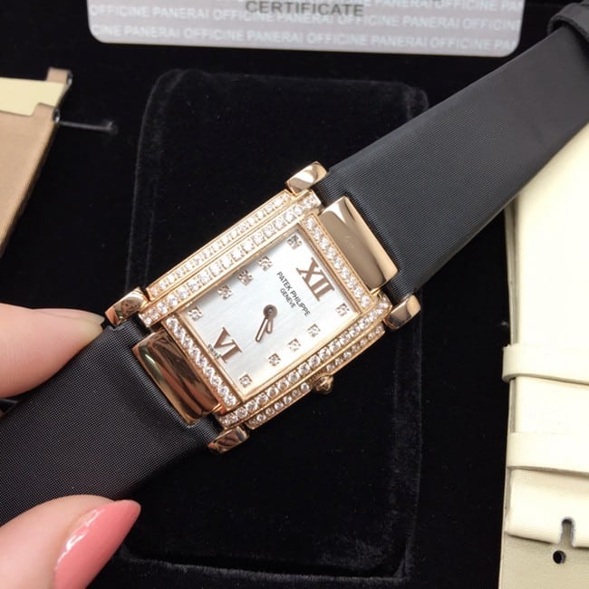 AW factory real diamond replicaPatek Philippewhite dial black belt ladies' watch front view
