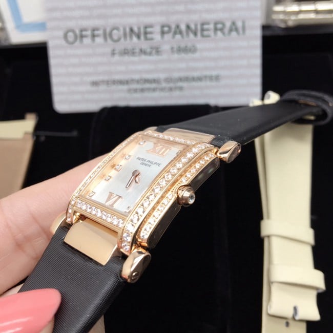 AW factory real diamond replicaPatek Philippewhite dial black belt ladies' watch side view