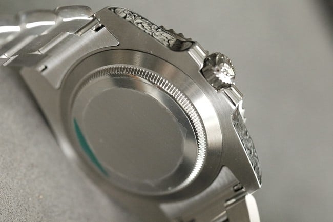 top-tier watch Rolex classic Black Submariner special edition engraved side view