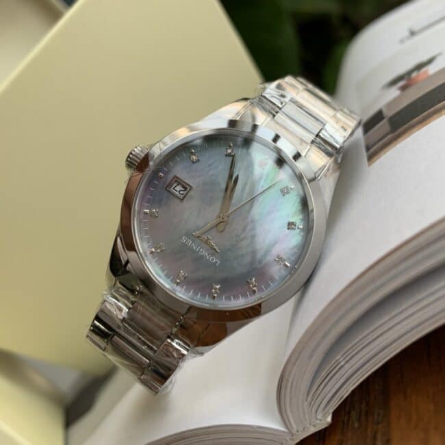 Longines Compaq series white steel blue background diamond ladies quartz watch 8mm ultra-thin design front view