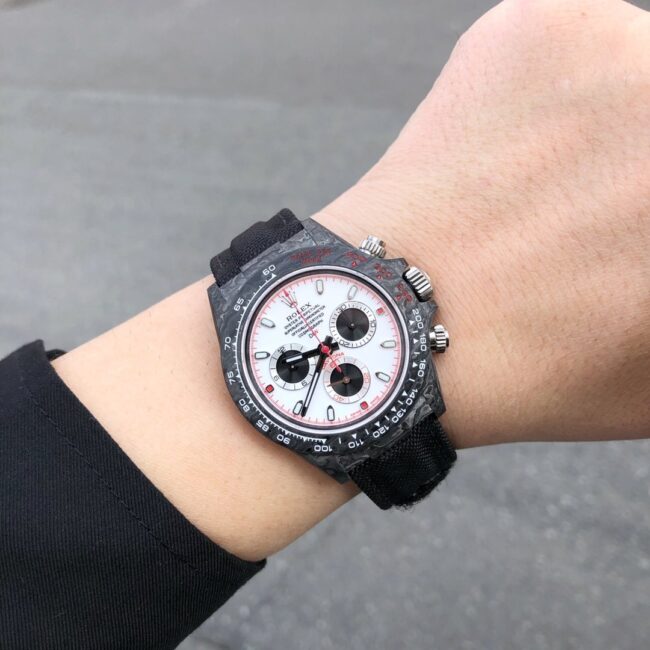 TW factory top-tier watch Rolex universe chronograph Daytona series carbon fiber customized version black dial white background men's watch front view