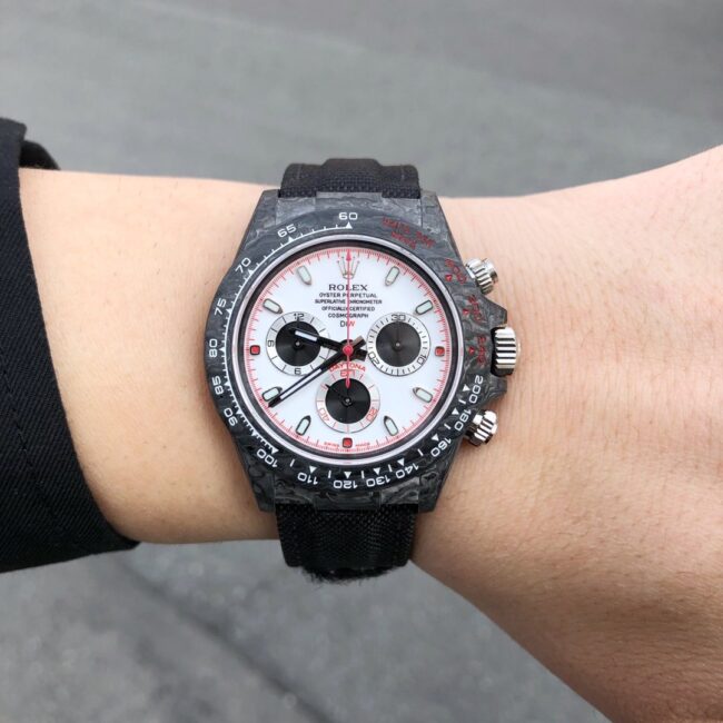 TW factory top-tier watch Rolex universe chronograph Daytona series carbon fiber customized version black dial white background men's watch front view