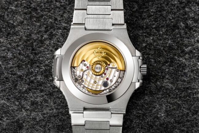 top-tier replicaPatek Philippe sporty and elegant baby's breath series Nautilus full diamond white steel blue dial men's mechanical watch movement picture