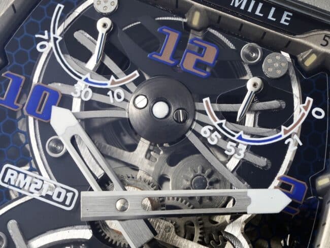 Large factory fine imitation Richard Mille black steel RM 21-01 aerodynamic tourbillon watch light wear-resistant carbon fiber and 5N red gold material detail picture