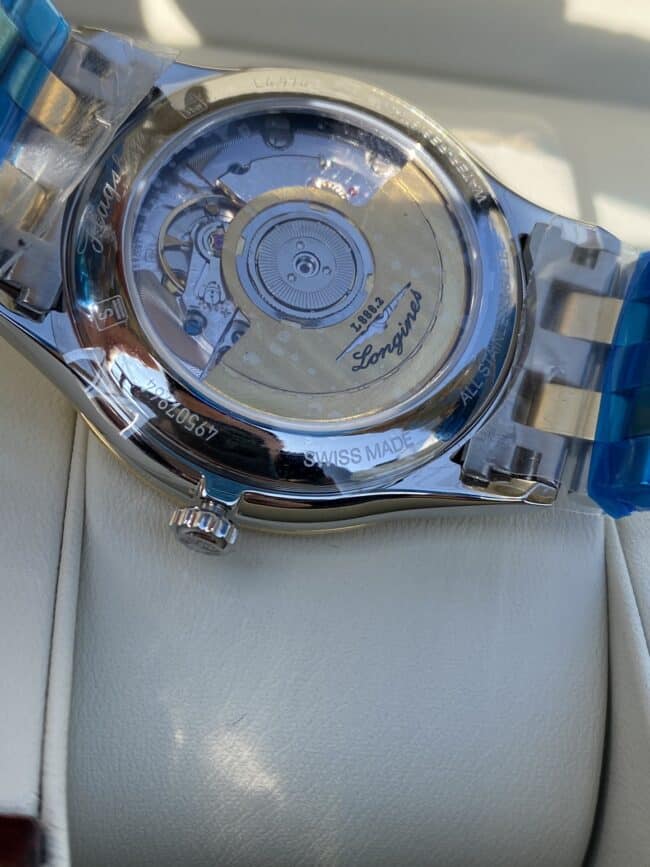top-tiersuper cloneLongines military flag series white steel Swiss carved movement couple watch movement picture