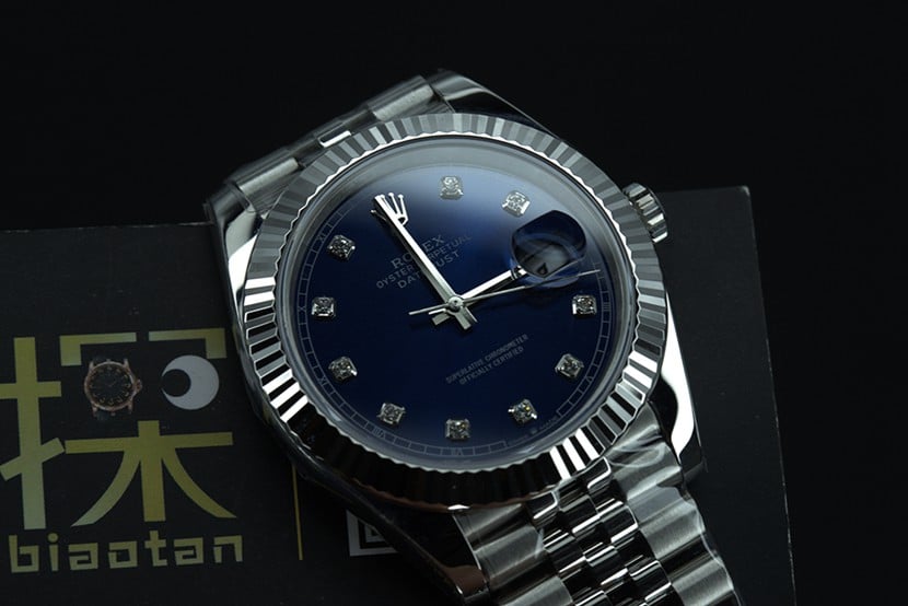 jvsRolex blue log watch tiger tooth ring