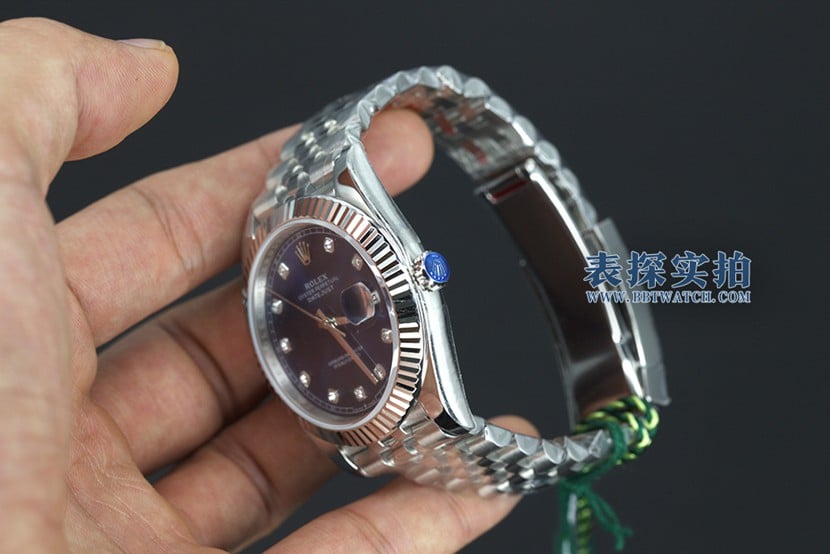 jvsRolex blue log watch tiger tooth ring