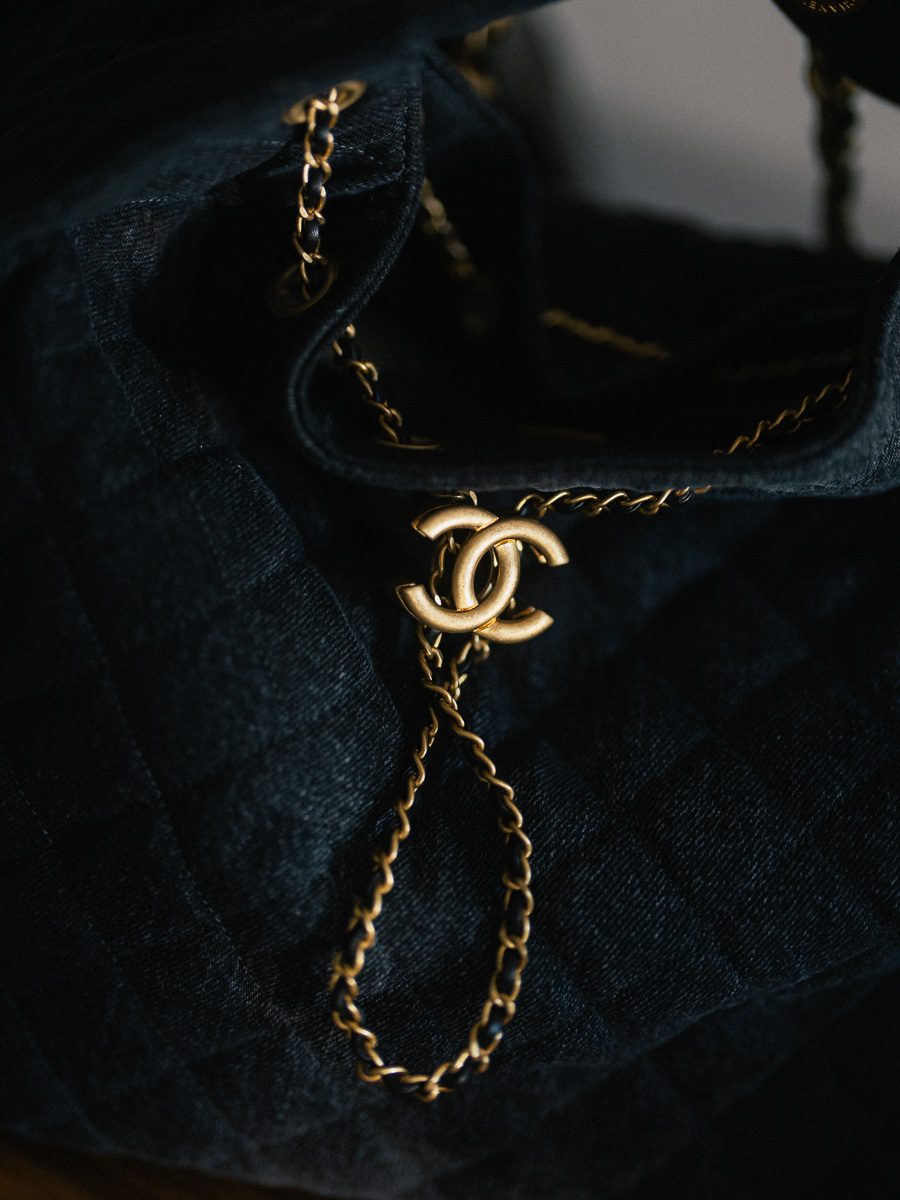 Chanel 25 Bag in black denim drawstring closure