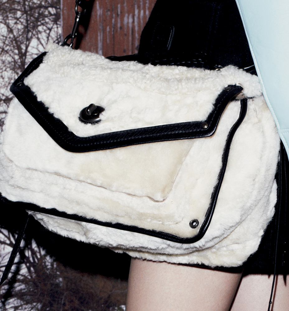 Coach Rhyder Shearling Messenger, $1,300 via Coach