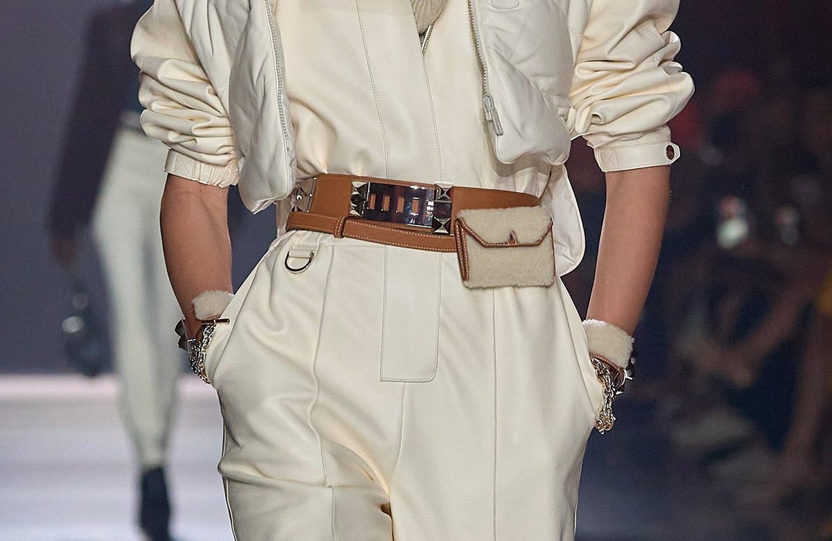 A Kelly Pocket Belt layered with a Gold Collar de Chien Belt (and matching cuffs). Herm&egrave;s AW24 Look 38. Photo via Vogue.com. 