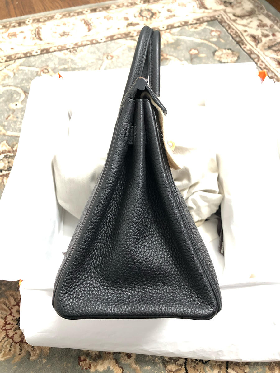 Side view of a Togo bag.