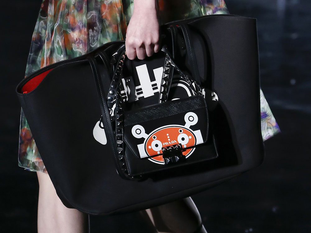 For Its Fall 2018 Bags, Prada Contemplates A Dark, Man-Made Future