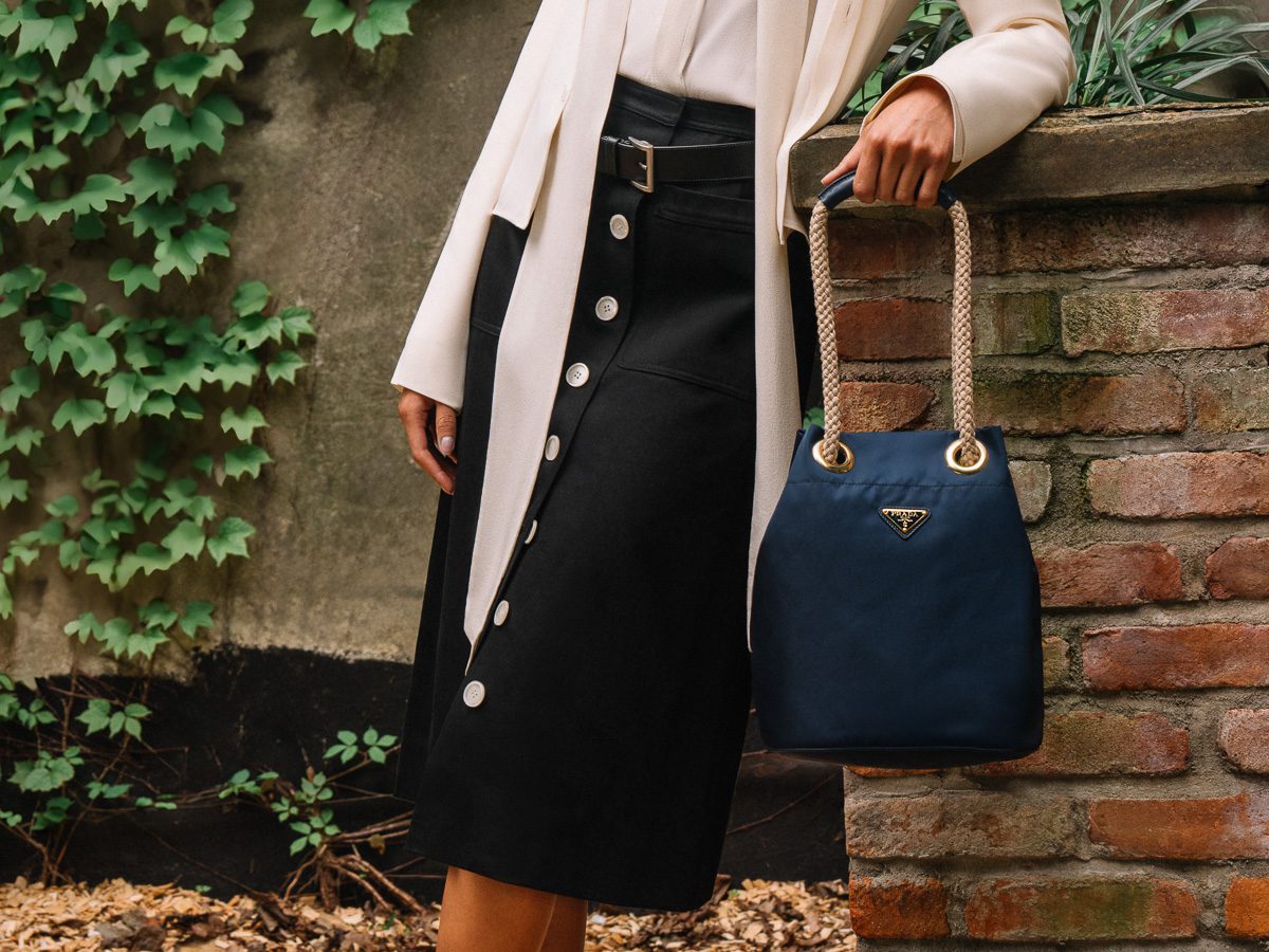 The Prada Mariner Bucket Bag Puts A Quintessential Summer Spin On A Classic House Fabric