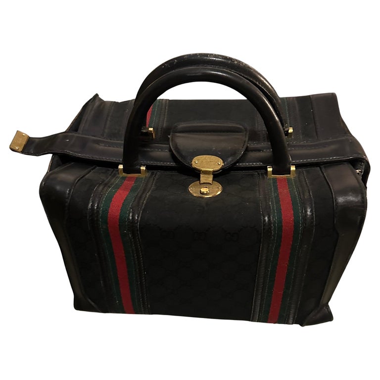 An Elegant 1980s Leather Small Travel Bag By Gucci